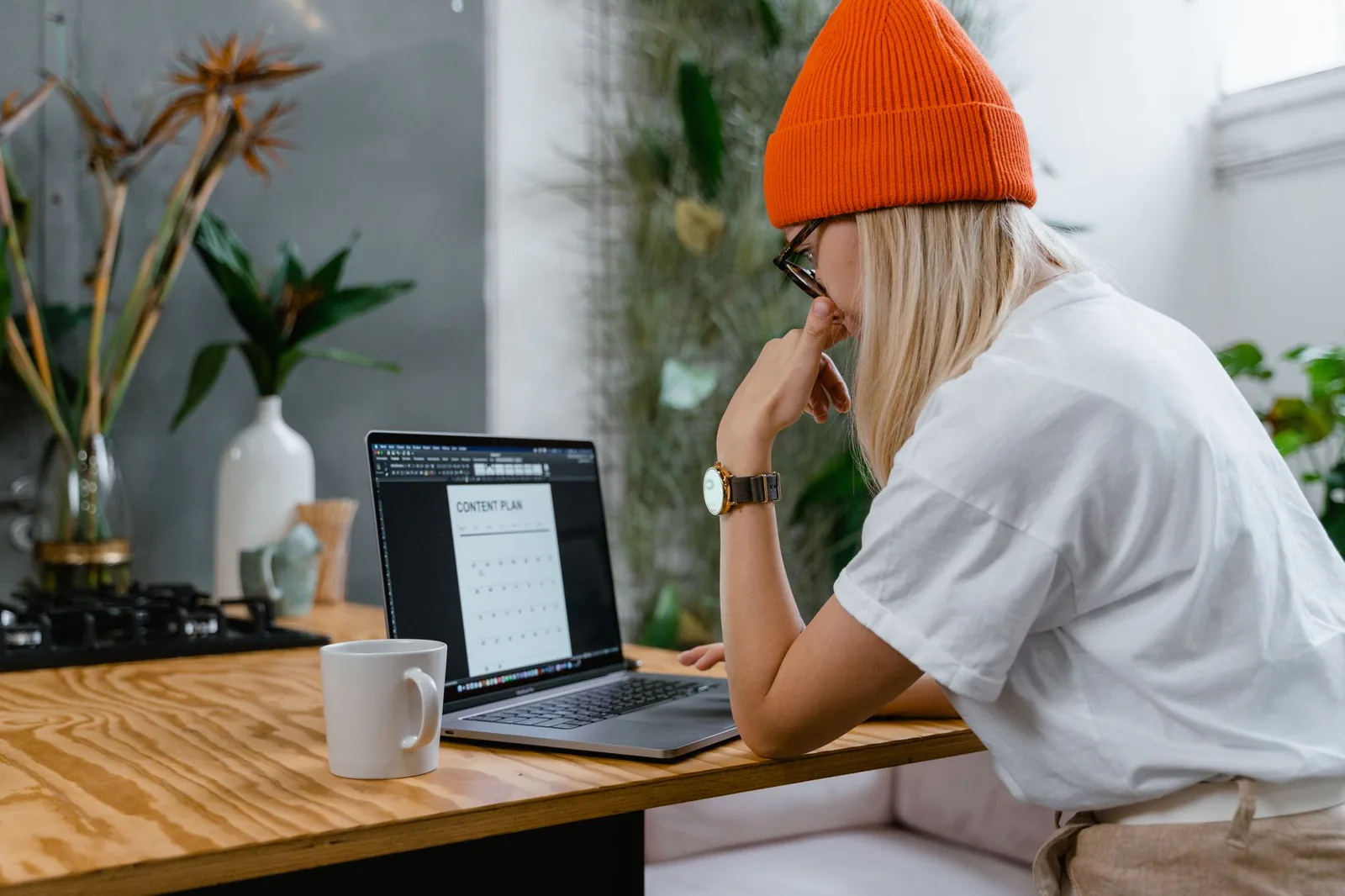 Small-business owner preparing a website for launch and promotion