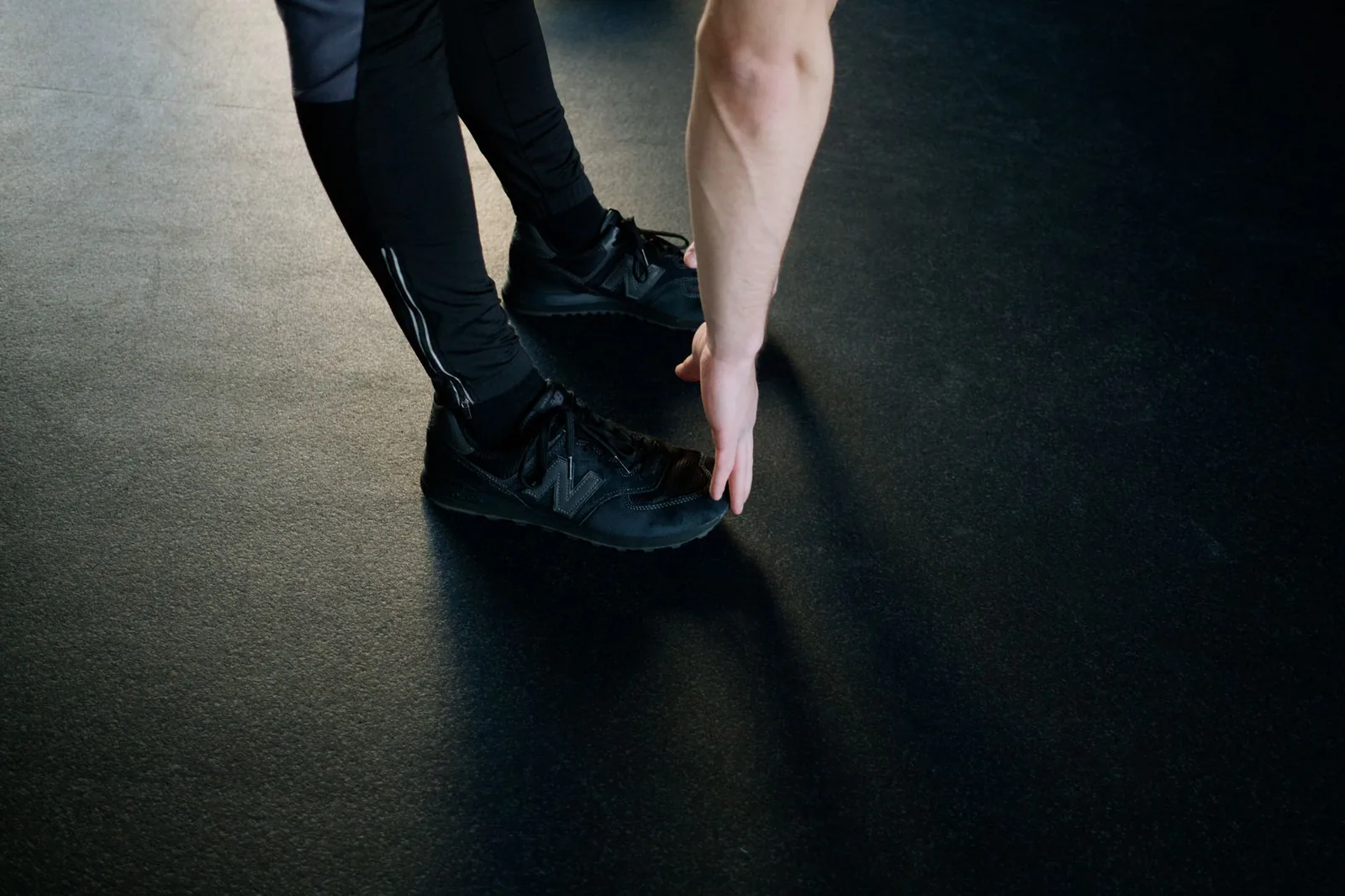Person stretching in a gym