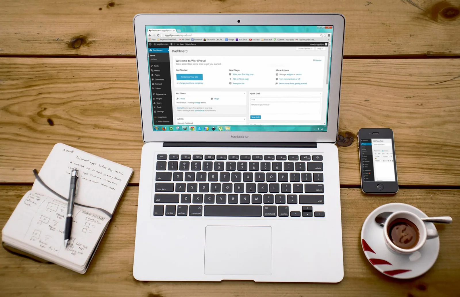 Business owner comparing website builders on a laptop in a home office