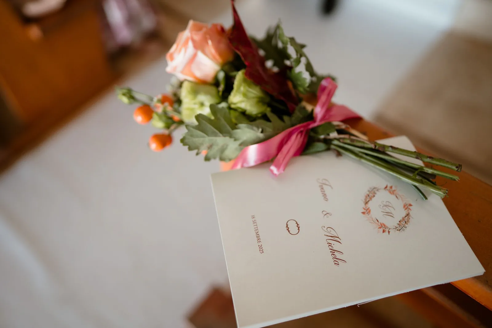 Elegant wedding program with floral bouquet